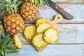 Fresh pineapple fruit sliced Ã¢â¬â¹Ã¢â¬â¹on a wooden cutting board Royalty Free Stock Photo